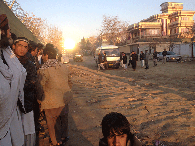 Lining up for voter-registration cards outside a school in northern Kabul. © Mujib Mushal