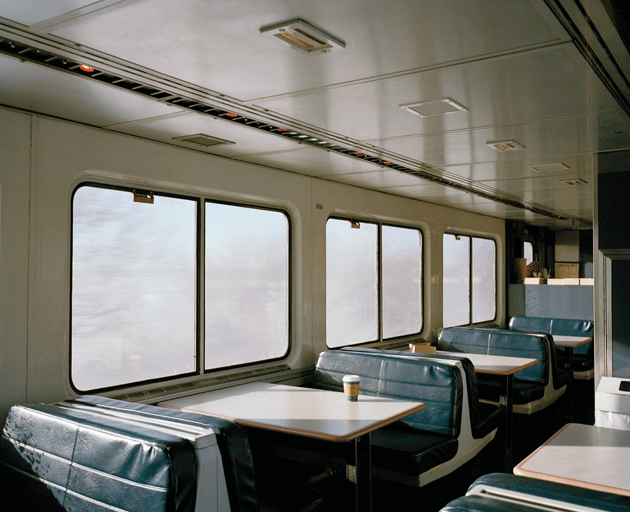 Empty café car near Tomah, Wisconsin, on the California Zephyr from Emeryville to Chicago. Unless otherwise noted, photographs by McNair Evans from In Search of Great Men, an ongoing project documenting long-distance travel on Amtrak.