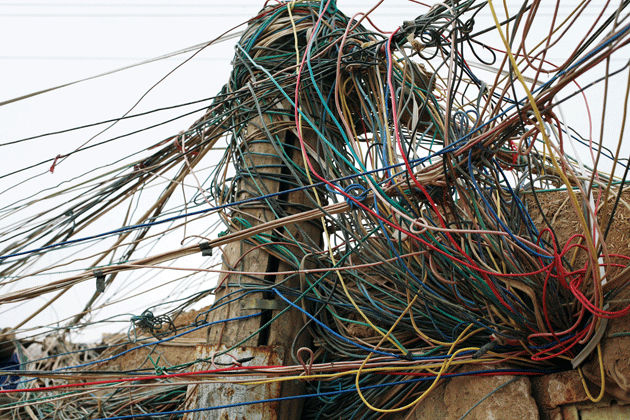 Electrical lines from a generator to homes in old Jassan, 2013