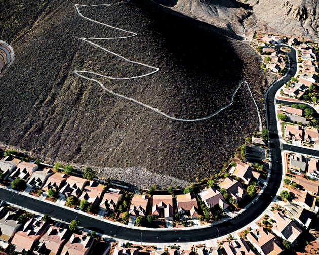 “City View hiking trail looking southeast, Sun City MacDonald Ranch development below, Henderson, Nevada,” from Lake Las Vegas/Black Mountain. Courtesy the artist and Radius Books