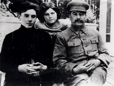 Joseph Stalin with his children Vasily and Svetlana, 1930s. Photograph by Pyotr Otsup © Heritage Image Partnership Ltd./Alamy