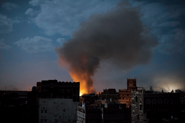 Smoke from an air strike on the al-Oradi Hospital, Sanaa, Yemen, June 9, 2015. Photograph by Alex Potter