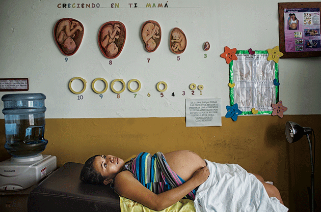 Abigail Sanches, from San Luis Talpa, La Paz, in an examination room at a maternal waiting house, Planes de Renderos. Women without close access to hospitals come to these facilities to wait out the end of their pregnancies