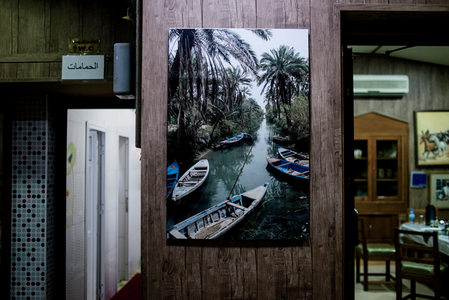 An old photograph of Basra in a restaurant. Photo from Basra, Iraq, July 2017, by Alex Potter