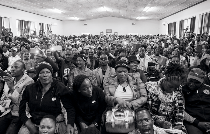 A hearing to gauge public opinion on a proposed amendment to the South African constitution that would allow for land seizures, Tzaneen, Limpopo, July 2018. Photograph by Madelene Cronjé © The artist