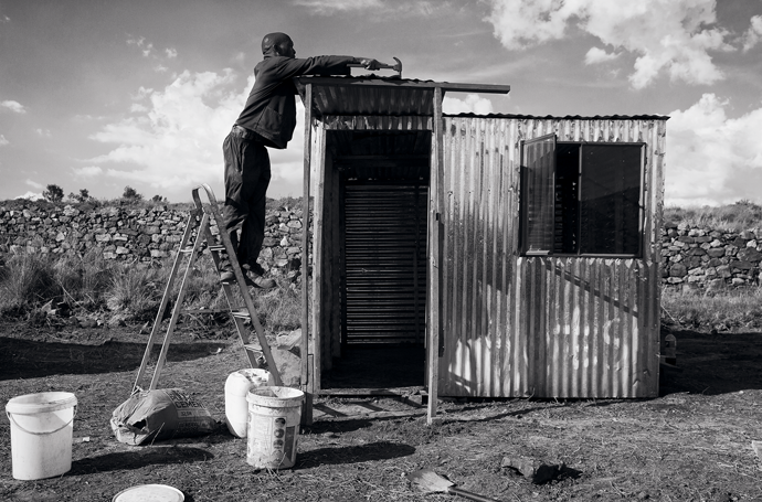 An informal settlement known as Kokotela, because of the sound made during the construction of corrugated iron houses, near Lawley township, Johannesburg. Photograph by James Oatway for Harper’s Magazine © The artist