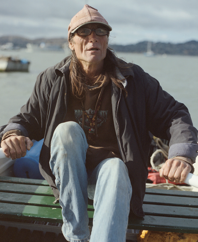 Dream Weaver, who lives on a restored lifeboat in Richardson Bay, travels to and from shore by skiff. All photographs by Therese Jahnson © The artist