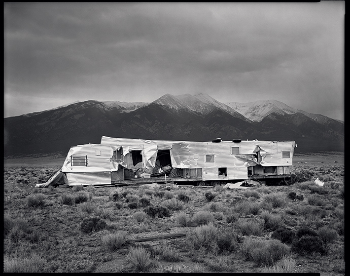An abandoned trailer, with Blanca Peak in the background (detail).