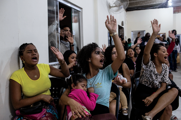 Churchgoers at the Assembleia de Deus Vivendo para Cristo, in Morro da Pedreira, a favela in the north of Rio de Janeiro