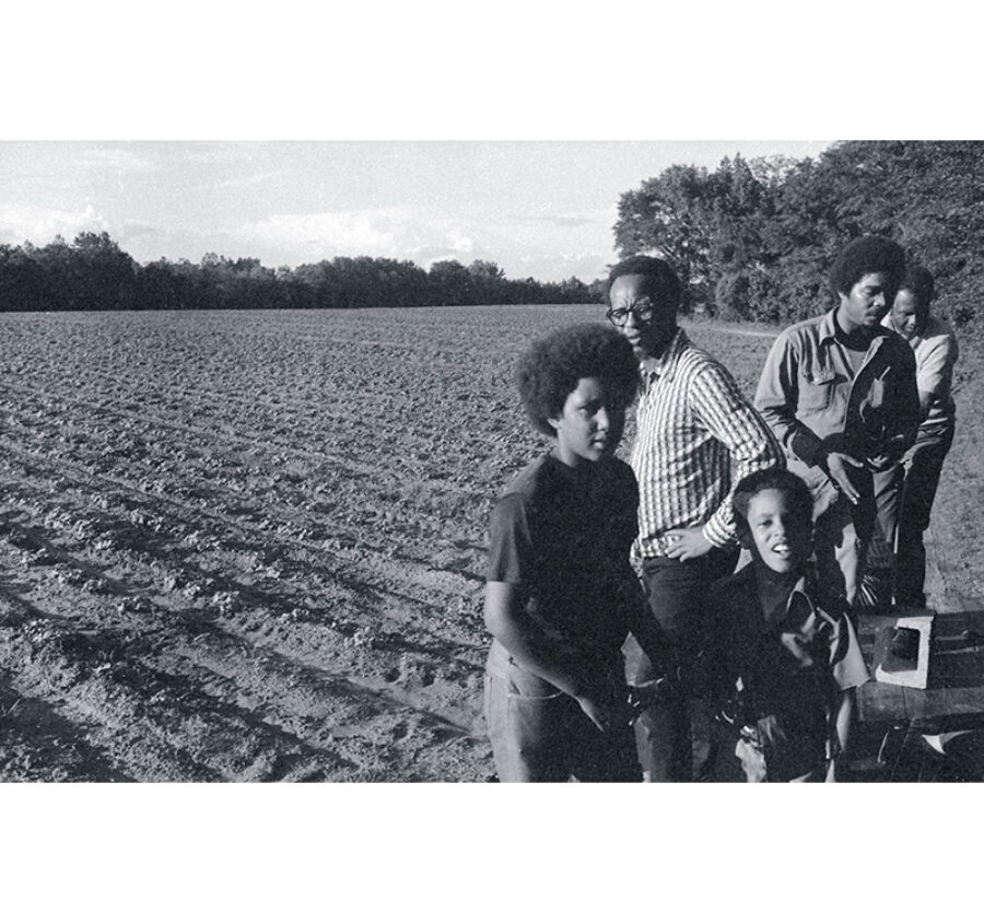 Charles Sherrod (second from left) at the New Communities farm in Georgia, 1973. Photograph by Joe Pfister. Courtesy New Communities and Open Studio Productions, from Arc of Justice: The Rise, Fall, and Rebirth of a Beloved Community